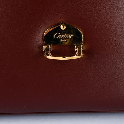 CARTIER, Must
Bordeaux leather briefcase
27.5...