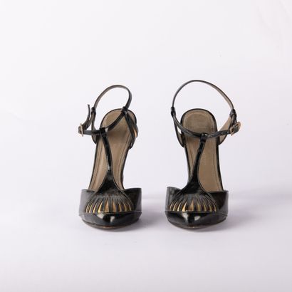 VERSACE. Pair of heeled sandals in black...