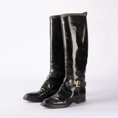 CHANEL. Pair of cavalier-style boots in black...