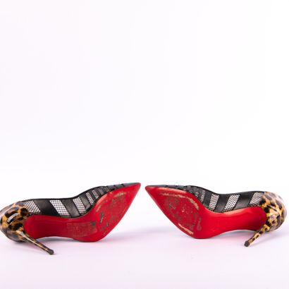 CHRISTIAN LOUBOUTIN. Black patent leather...