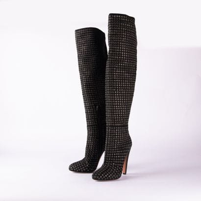ALAÏA PARIS. Black suede calfskin thigh-high...