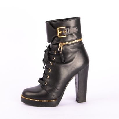 SERGIO ROSSI. Black leather heeled boots,...