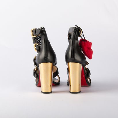CHRISTIAN LOUBOUTIN. Pair of heeled sandals...