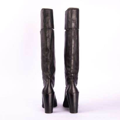 PIERRE HARDY. Black leather heeled boots,...