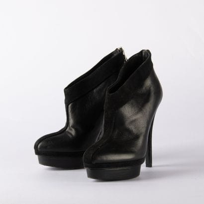 YVES SAINT LAURENT. Pair of heeled ankle...