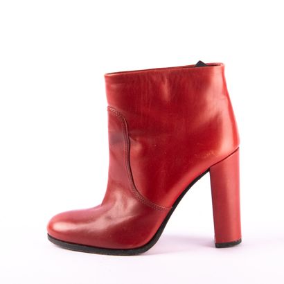 Lot of three pairs of shoes
PRADA. Red leather...