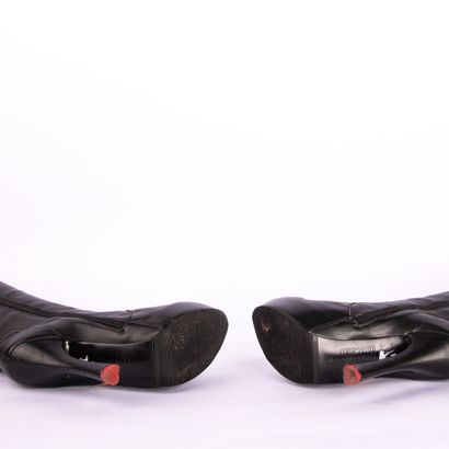 MOSCHINO. Black leather boots with 13 cm...