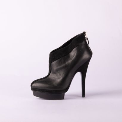 YVES SAINT LAURENT. Pair of heeled ankle...