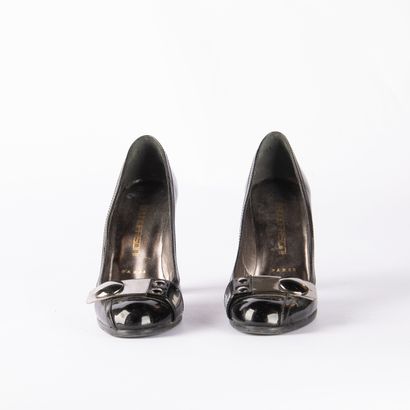 Lot of four pairs of black pumps. 1/ BRUNO...