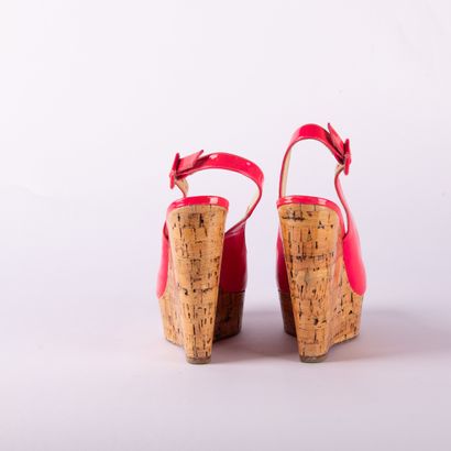 CHRISTIAN LOUBOUTIN. Pair of Altike wedge...