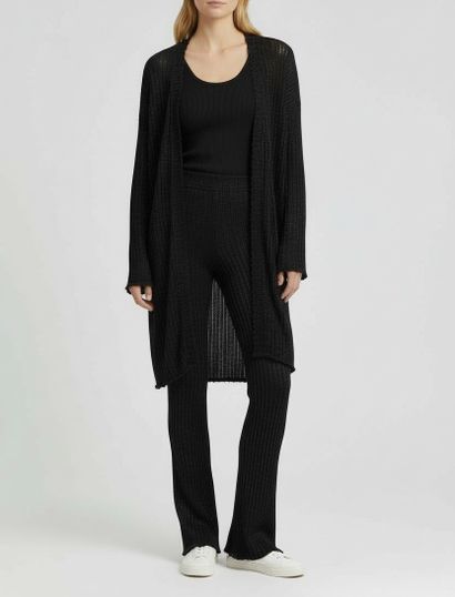 ALAÏA PARIS. Set comprising a navy blue long...