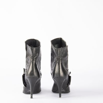 Lot including two pairs of boots and one...