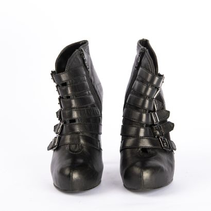 Lot of three pairs of shoes
PRADA. Red leather...