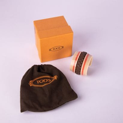 TOD'S
Cuff bracelet, in dustbag, with box
5...