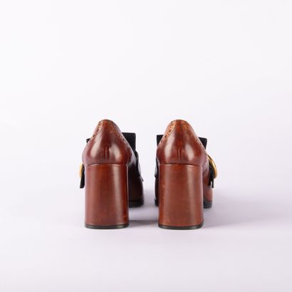 PRADA. Pair of brown and black leather square-heeled...