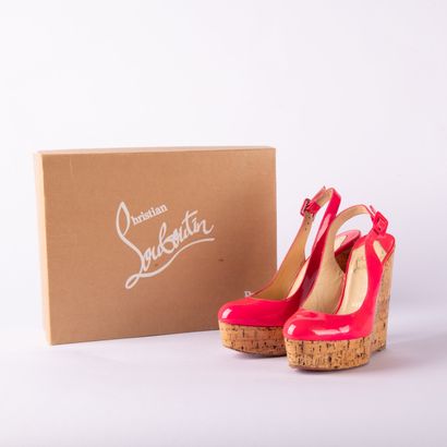 CHRISTIAN LOUBOUTIN. Pair of Altike wedge...