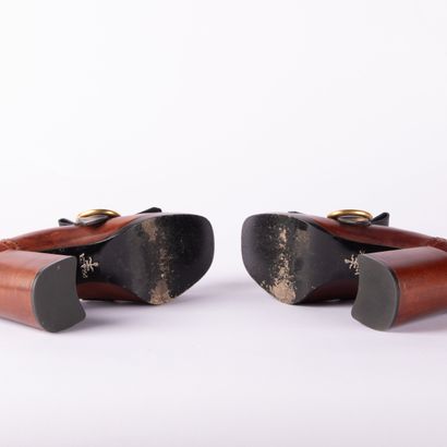 PRADA. Pair of brown and black leather square-heeled...