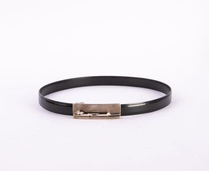 CARTIER. Alligator leather belt, signed gold...