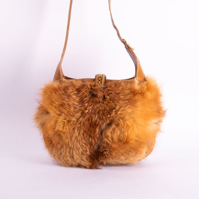 GUCCI. 
Circa 1970. Rare leather and fur...