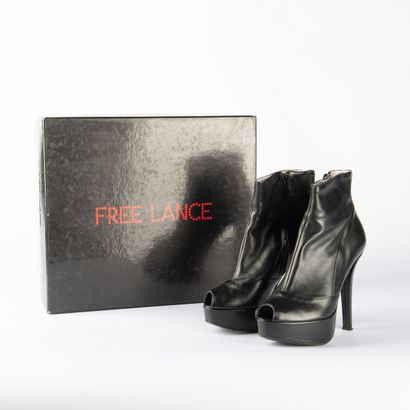 Four pairs of black heeled boots. 1/ CHARLES...
