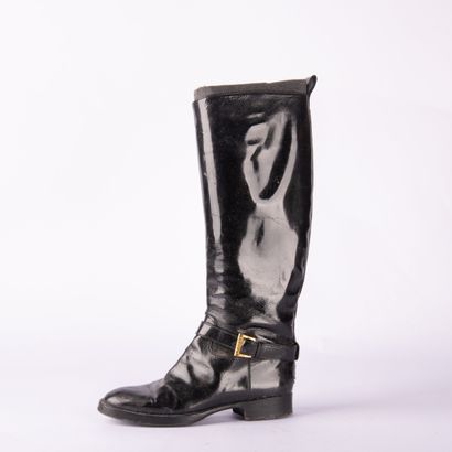 CHANEL. Pair of cavalier-style boots in black...