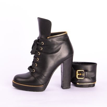 SERGIO ROSSI. Black leather heeled boots,...