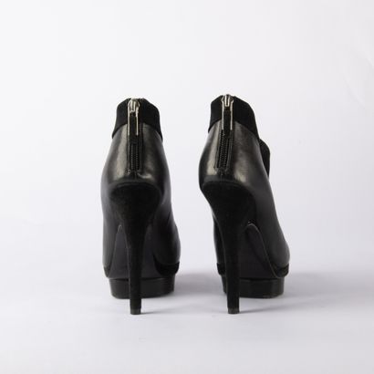 YVES SAINT LAURENT. Pair of heeled ankle...