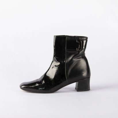 Four pairs of black heeled boots. 1/ CHARLES...