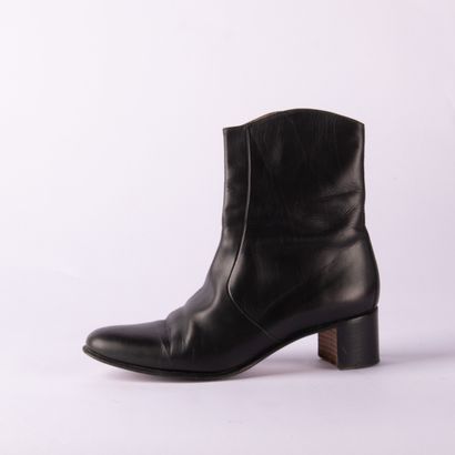 HERMÈS. Pair of black leather ankle boots...