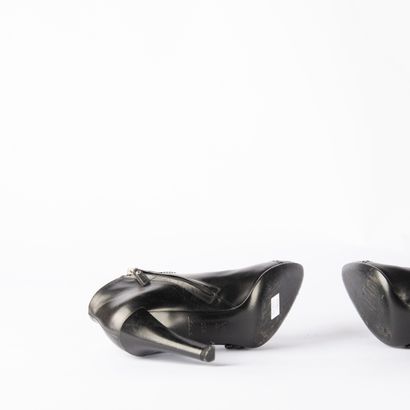 LOUIS VUITTON. Pair of black leather heeled...