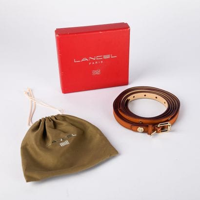 LANCEL
Long belt (two turns) in stamped camel...