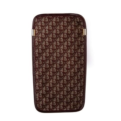 CHRISTIAN DIOR, circa 1970. Case in burgundy...