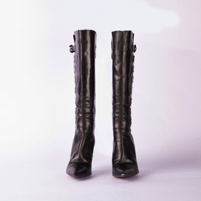 Lot including two pairs of boots and one...