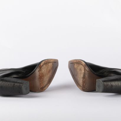Four pairs of black heeled boots. 1/ CHARLES...