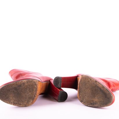 Lot of three pairs of shoes
PRADA. Red leather...