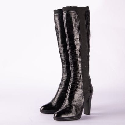 SERGIO ROSSI. Pair of heeled boots in aged-effect...