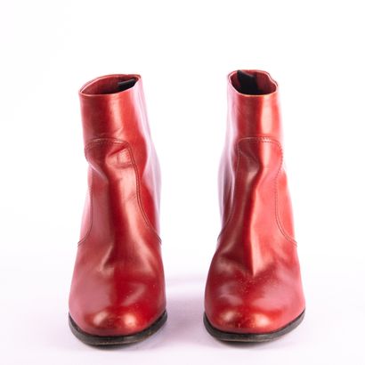 Lot of three pairs of shoes
PRADA. Red leather...