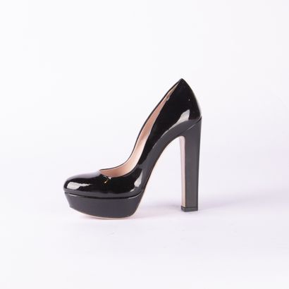 MIU MIU. Pair of black patent leather platform...