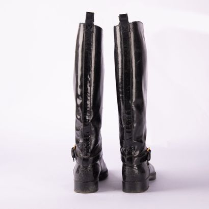 CHANEL. Pair of cavalier-style boots in black...