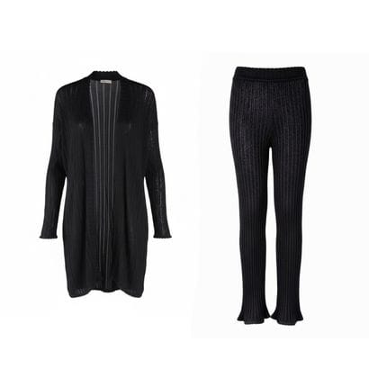 ALAÏA PARIS. Set comprising a navy blue long...