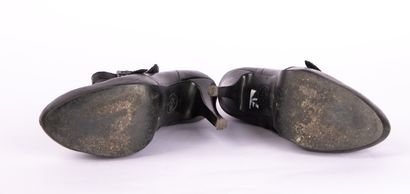 Lot of three pairs of shoes
PRADA. Red leather...