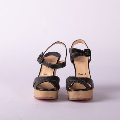 CHRISTIAN LOUBOUTIN. Pair of black leather...