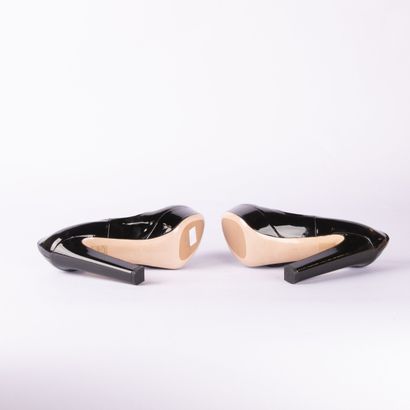 MIU MIU. Pair of black patent leather platform...