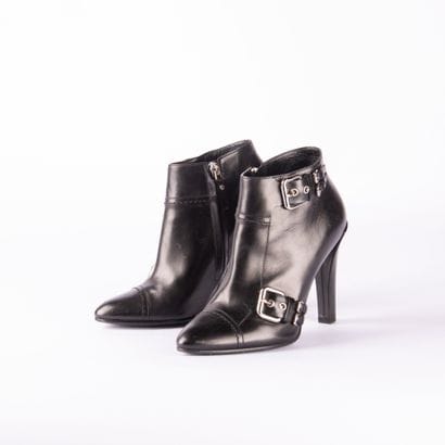 LOUIS VUITTON. Pair of black leather heeled...