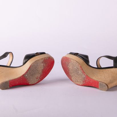 CHRISTIAN LOUBOUTIN. Pair of black leather...