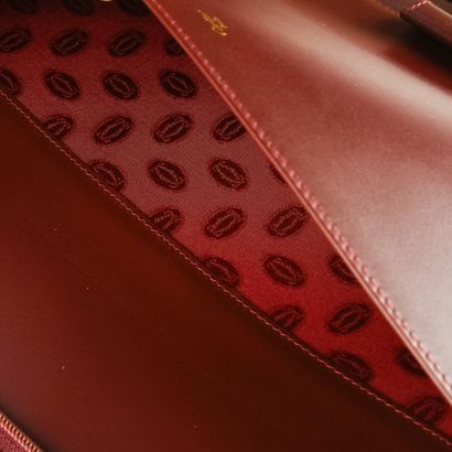 CARTIER, Must
Bordeaux leather notepad holder
25...