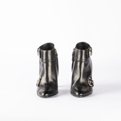 LOUIS VUITTON. Pair of black leather heeled...