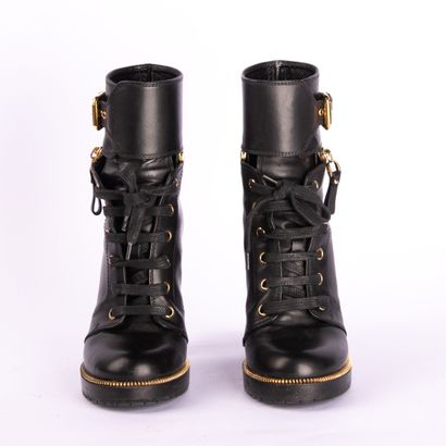 SERGIO ROSSI. Black leather heeled boots,...