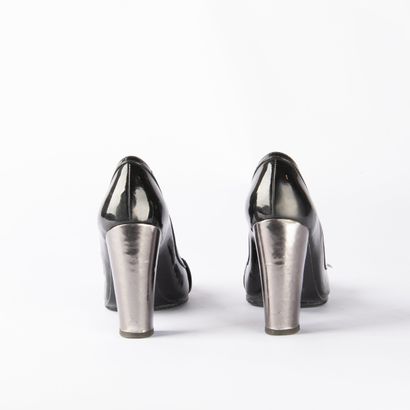 Lot of four pairs of black pumps. 1/ BRUNO...