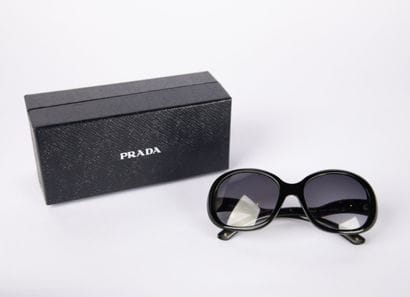 PRADA
Sunglasses, in a case